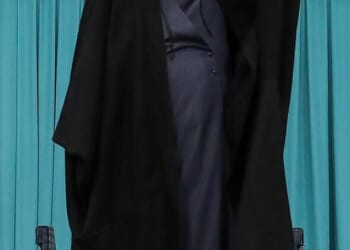 Pictured: Iranian Supreme Leader Ali Khamenei waves during a meeting in Tehran today