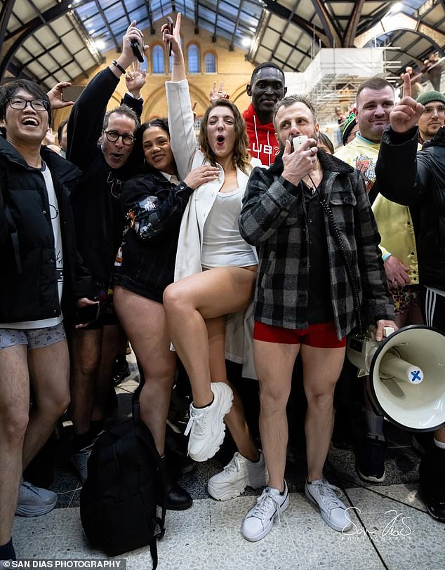 'No Trousers Tube Ride' organiser Dave Selkirk (front, with loudhailer) in London on Sunday
