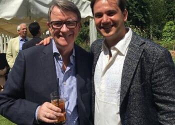 Lord Mandelson with Reinaldo Avila da Silva at a garden party in London