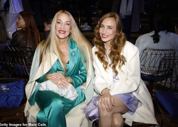 Jerry Hall joined her lookalike daughter Elizabeth Jagger at the Marc Cain show during Berlin Fashion Week on Friday