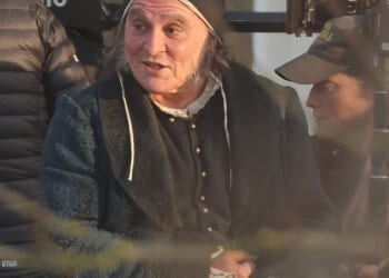 Johnny Depp was pictured for the first time in character as Ebenezer Scrooge as filming got under way in the UK on a new adaptation of A Christmas Carol