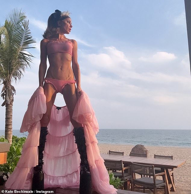 Kate Beckinsale posed in a pink bikini in an Instagram post, before hitting back at skinny-shamers