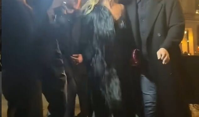 Kate Moss saved herself from a fashion week fall on Tuesday night as she arrived for the Saint Laurent Paris Fashion Weekshow