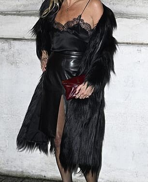 She may not be on the catwalk, but Kate Moss showed off her supermodel status as she arrived for the Saint Laurent Paris Fashion Week show on Tuesday