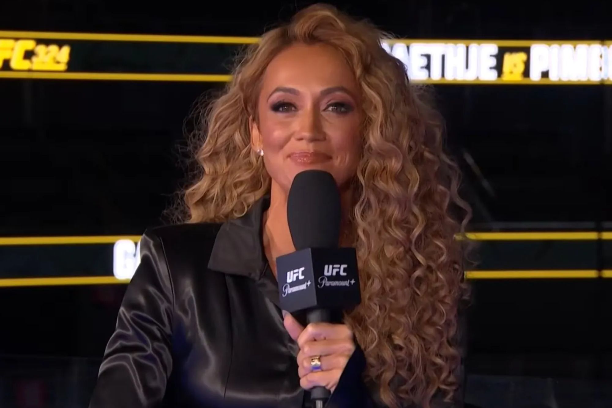 An image collage containing 1 images, Image 1 shows Female sports commentator holding a microphone with UFC logos