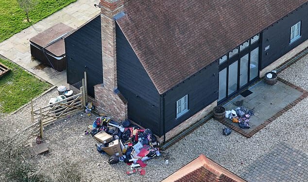 Katie Price has been warned she faces being booted out of her new £4,500-a-month home if the property becomes a second 'Mucky Mansion', after rubbish emerged outside the property