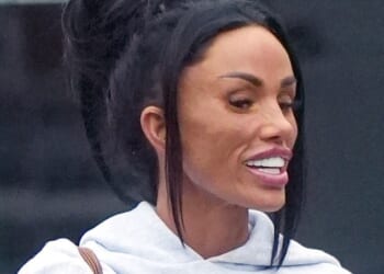 Katie Price proudly showed off her 'kissable' new lips as she headed to a sunbed shop in Sussex on Friday