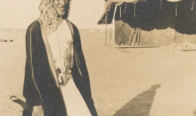 Lawrence of Arabia's pictures have been given a trigger warning for the cultural appropriation of a traditional Arab outfit. Pictured is the 1917 photograph that triggered the warning