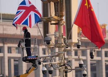 Flags are set up in preparation for Keir Starmer's arrival in Beijing today