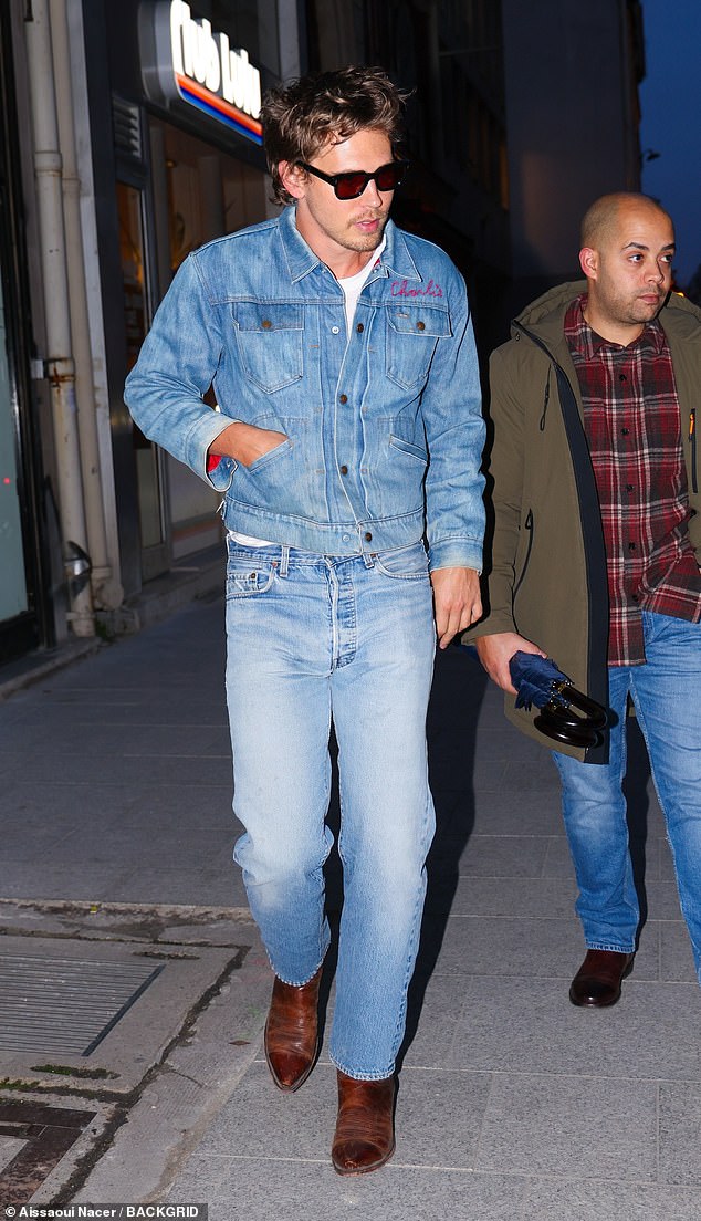 Actor Austin Butler was also seen strolling through Paris on Wednesday, opting for double denim has stepped out at night