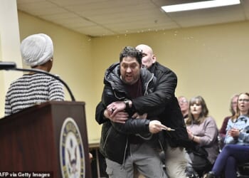 Ilhan Omar was attacked by a man who yelled that she 'should resign' before using a syringe to spray an unknown liquid at the Minnesota Congresswoman