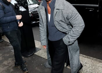 Lucien Laviscount showed off his dashing new moustache as he arrived at the Dolce & Gabbana show during Milan Fashion Week on Saturday