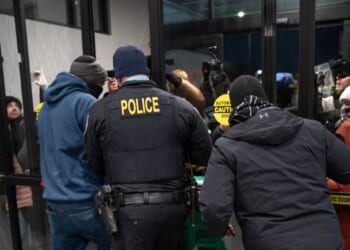 Rioters protest at a hotel on Jan. 25, 2026, in Minneapolis, Minnesota.