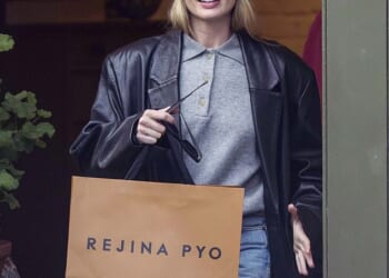 Australian actress Margot Robbie carries a bag from designer Rejina Pyo's fashion and homeware boutique in Notting Hill on January 14