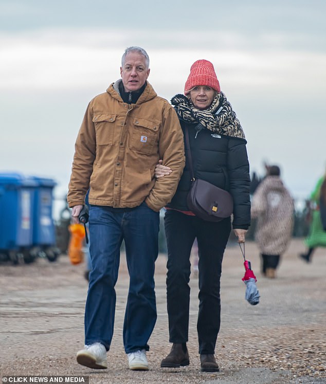 Zoe, 55, was spotted snuggling up to BAFTA-winning production designer Mathieu Weekes, 49, during a low-key stroll near the Brighton home the TV star moved her beau into last year