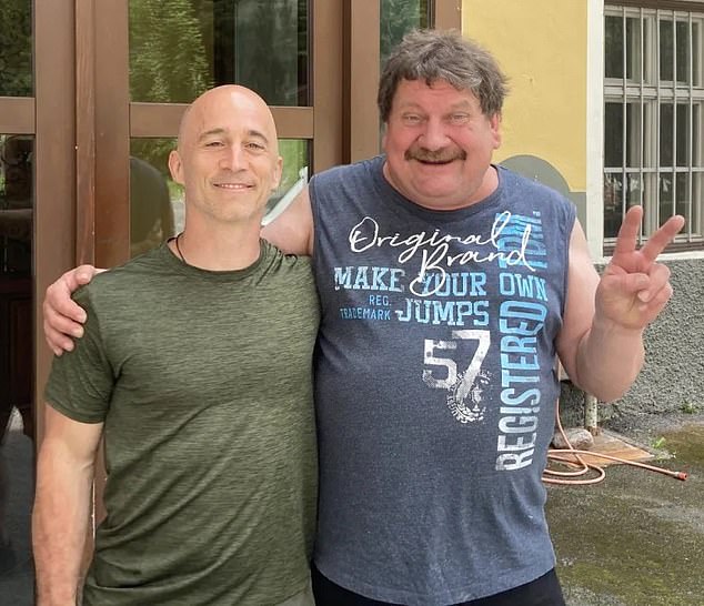 Researcher Antonio Osuna-Mascaró (left) is pictured with Veronika's owner Witgar Wiegele (right)