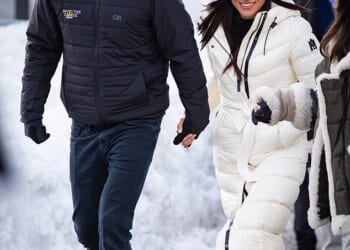 Harry and Meghan walk hand in hand at the Hillcrest Recreation Centre at the Invictus Games on February 10 2025