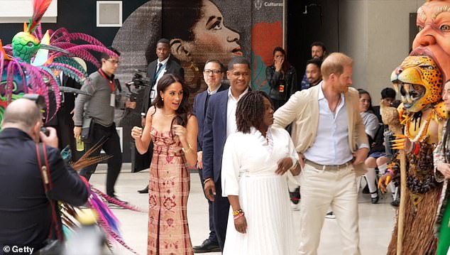 Meghan Markle (left) sought to 'take the lead' when a 'rogue' Prince Harry (right) upset her 'carefully planned choreography' during their quasi-royal Colombian tour in August 2024, a body language expert has claimed
