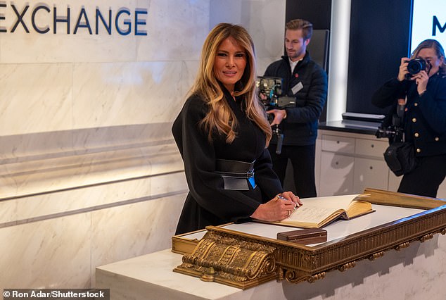 First Lady Melania Trump poses at the New York Stock Exchange, where she rang the bell Wednesday morning as part of her promotion for the new Melania documentary