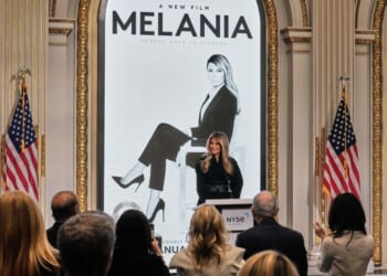 First lady Melania Trump delivers remarks promoting a new movie about her life in the New York Stock Exchange board room before ringing the opening bell, Wednesday.