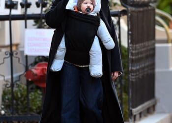 Michelle Williams was seen with her new baby for the first time on Wednesday - five months after revealing she had quietly welcomed a fourth child via surrogate