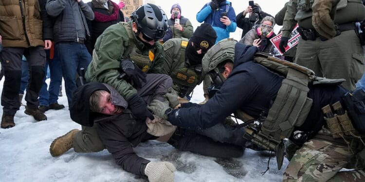 Minneapolis erupts as protesters clash with riot cops after ICE shoots Renee Nicole Good: Live updates