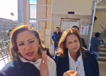 Footage captured the moment Lopez began speaking with those gathered outside the building before a circular device is seen flying through the air in her direction