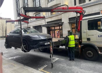 The £200,000 super car was lifted on low-loader and towed away for being illegally parked