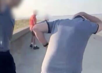 A video seen by the jury shows one of the boys smacking Mr Cashford over the back of the head with a glass bottle