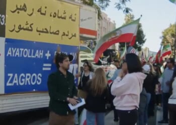 Moment truck ploughs into crowd of Iranian protesters in LA before cops drag driver away