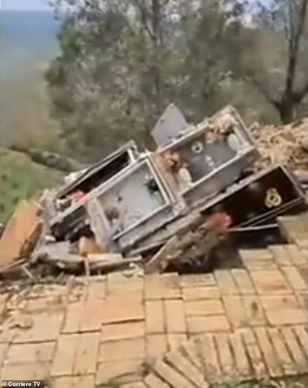 In San Mauro Marchesato, Crotone, around 20 coffins ended up piling into a ravine after heavy rains destroyed part of the town's old cemetery