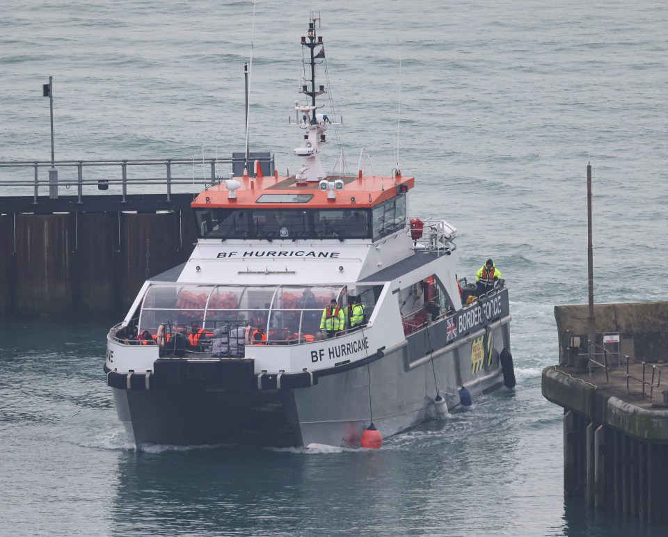 The UK Border Force vessel BF Hurricane transports migrants into the Port of Dover.