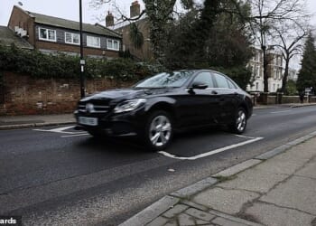 Five of the 12 cushions measured appeared to be between 100mm and 105mm high, the survey alleged. A car is pictured mounting one of the speed bumps on the Lewisham street