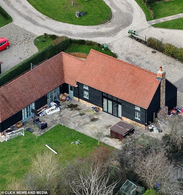 Shocking new pictures reveal bin bags, debris and junk strewn around the outside and dumped at the rear of the property, leaving onlookers stunned