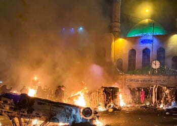 Images appeared to show a huge fire ripping through a government building in Karaj, near Tehran