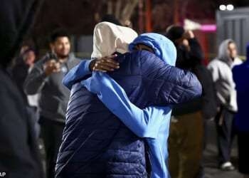 Friends and family hugged one another after a fatal shooting in a parking lot of The Church of Jesus Christ of Latter-day Saints in Salt Lake City on Wednesday night