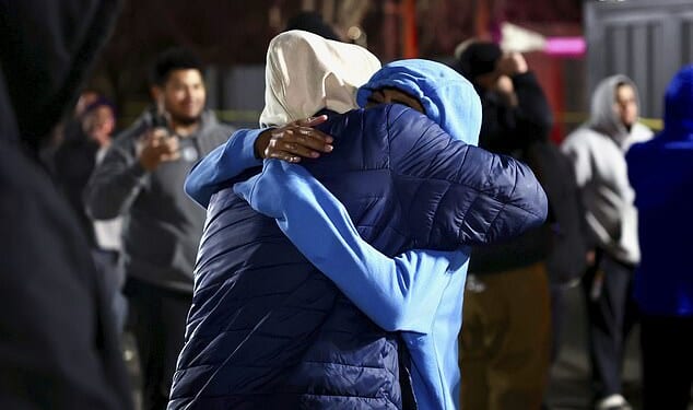Friends and family hugged one another after a fatal shooting in a parking lot of The Church of Jesus Christ of Latter-day Saints in Salt Lake City on Wednesday night