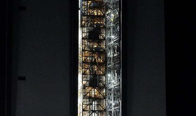 Pictured: Early in the morning on Saturday, January 17, NASA begins to move the Artemis II rocket out of the Vehicle Assembly Building at NASA's Kennedy Space Center. Next month, it will be used for the first manned-mission to the moon since 1972