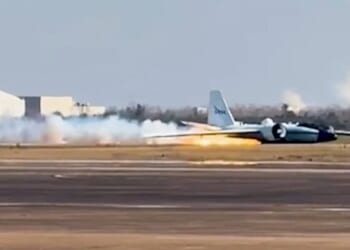 Footage captured the moment the plane skidded across the runway, leaving a trail of flames behind