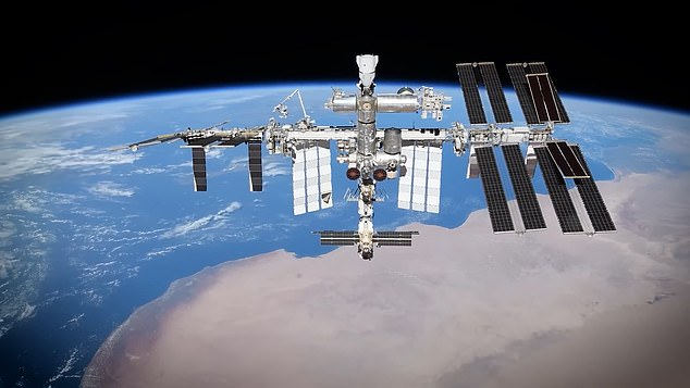 NASA cancelled a planned spacewalk on Thursday involving the crew of the International Space Station (Pictured) over an unspecified medical issue involving one of the astronauts