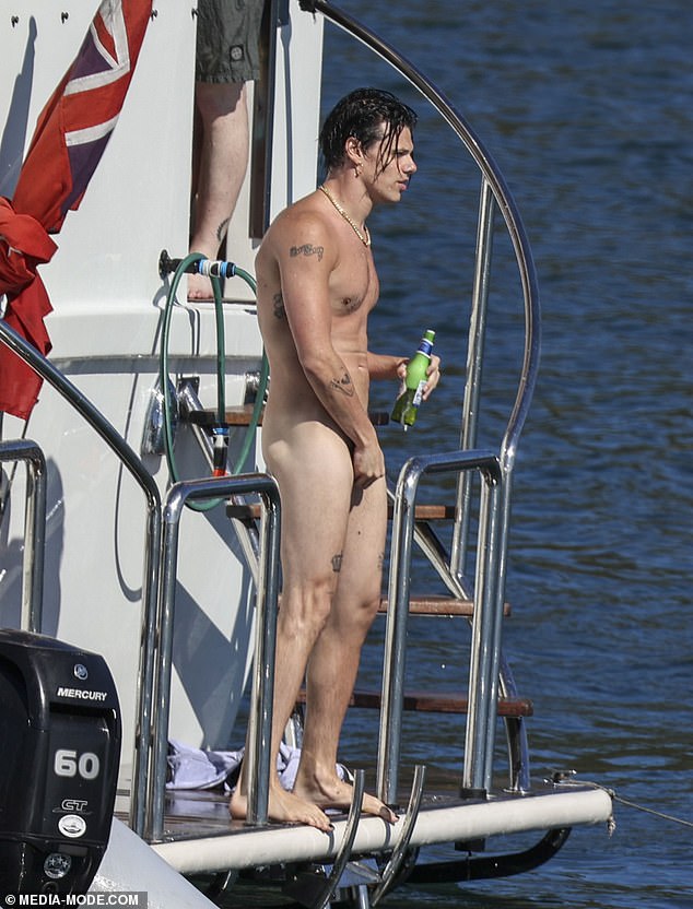 Yungblud wore a gold chain and a single gold earring