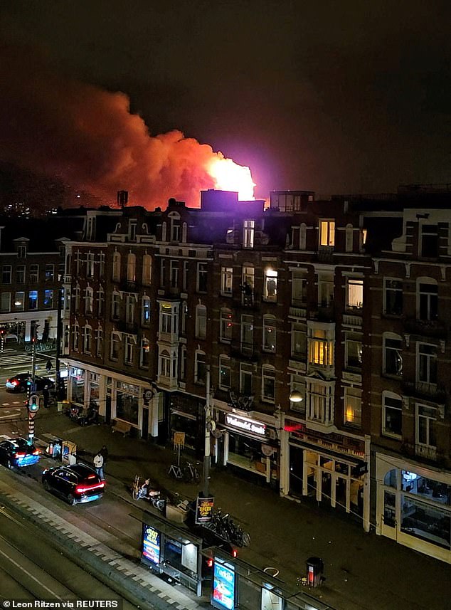 Flames and smoke rise from a fire at Vondelkerk church in Amsterdam, Netherlands, January 1, 2026