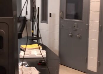 Video shows the prison guards going calmly about their business just 30 minutes after Epstein was found dead in his cell