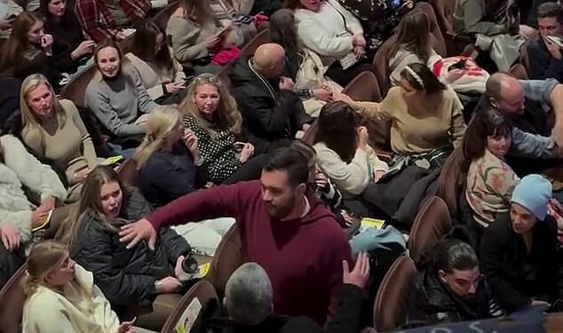 A video has gone viral depicting a man's outburst at the Mamma Mia! show on Broadway. He screamed at the women behind him until an usher finally came to his aid, pictured above