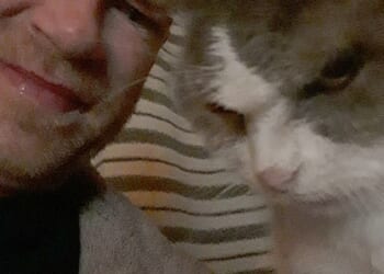 A man has paid nearly £16,000 to have his pet cat cryogenically frozen at a specialist facility in Switzerland, in the hope that medical advances will one day bring her back to life. Mark McAuliffe is pictured with his beloved Bonny