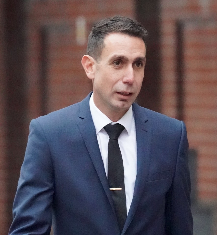 Former Premier League referee David Coot in a blue suit and black tie.