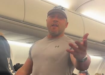 An angry, unidentified male flyer was seen on video having a dramatic outburst on board a Southwest Airlines flight. According to social media users, he was upset over a man talking to his wife