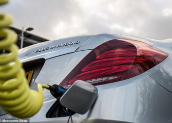 Car manufacturers are accused of misleading drivers about the cost saving benefits of plug-in hybrid vehicles PHEVs with a think tank calling it 'a scandal with echoes of dieselgate'