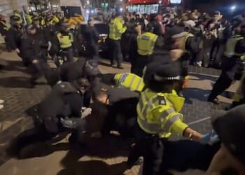 Four police officers suffered minor injuries and 14 people were arrested on suspicion of offences including violent disorder and trespass after a protest at the Iranian Embassy in London, the Metropolitan Police said