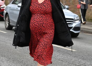 Pregnant Rebecca Adlington showed off her growing bump as she joined her husband Andy Parsons at a baby event in Cheshire on Thursday